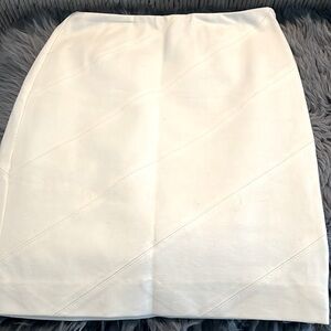 White House Black Market Ecru stretch A line skirt.